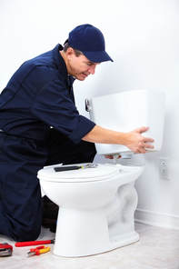man installing new toilet 